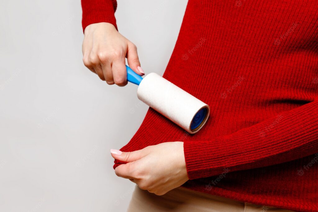 Use a lint roller - How to Remove Lint From Clothes